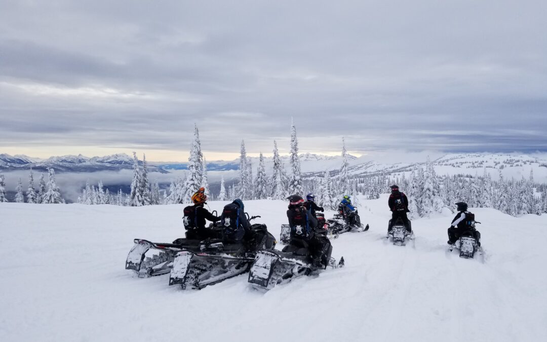 Group of snowmobilers in Revelstoke