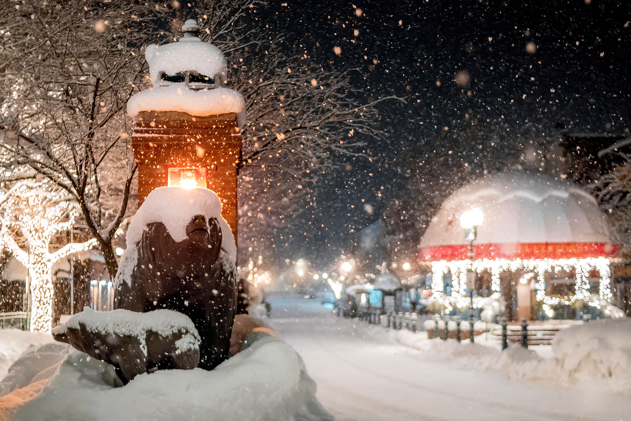 Snow covers the bronze bear statue in downtown revelstoke